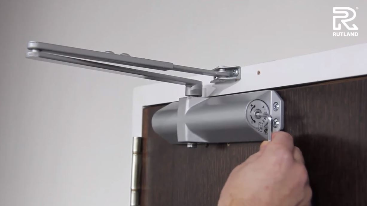 About power-adjustable door closers